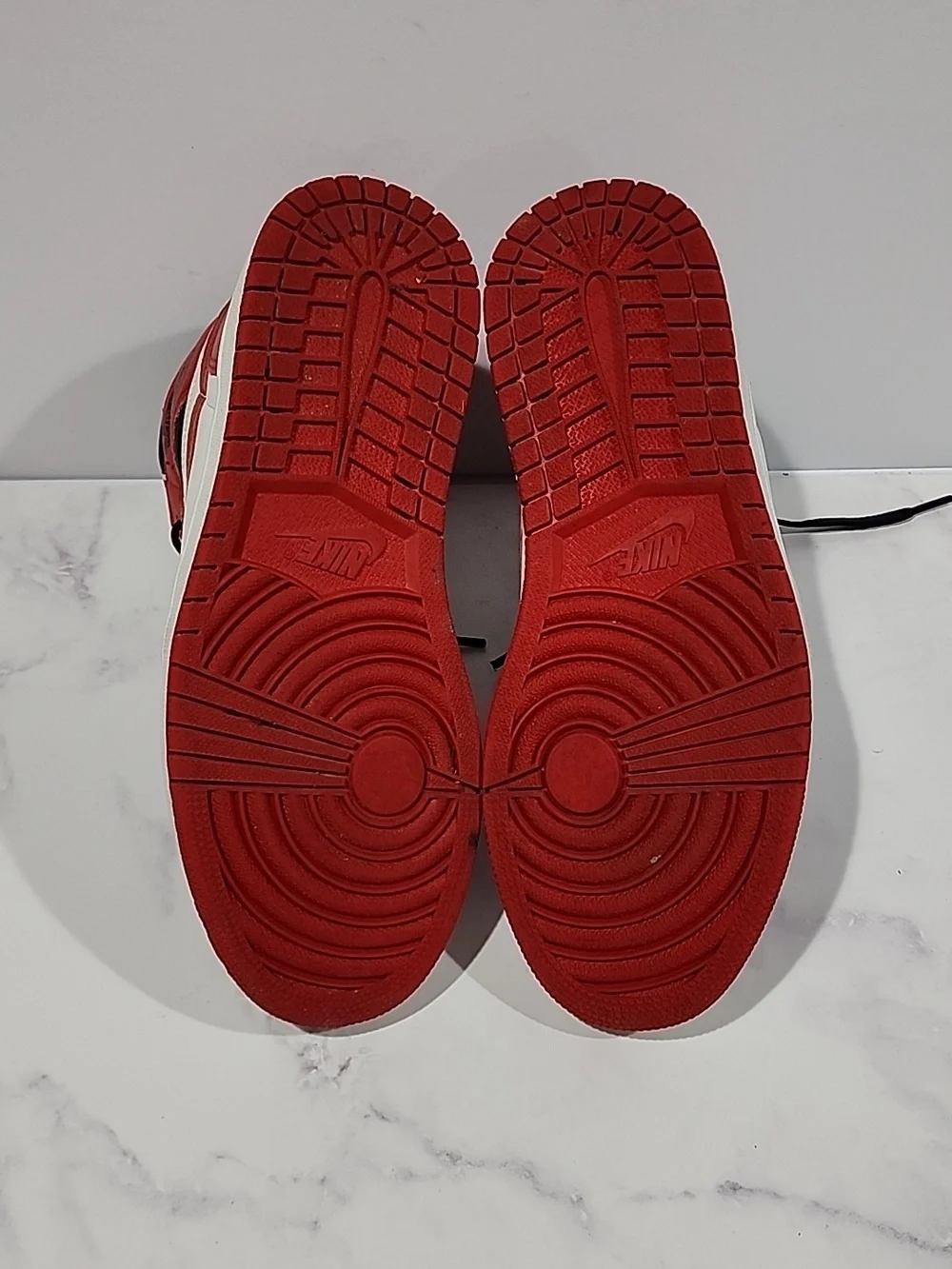 Nike  Air Jordan 1 Red and White High-Top Sneakers